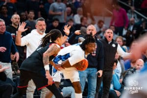 Creighton Bluejay guard Jamiya Neal (5) defends the ball against Connecticut Husky guard Solo Ball (1) during the semi-final round in the Big East Tournament Friday, March 14, 2025, New York, New York. Photo by Jordan Arnold.