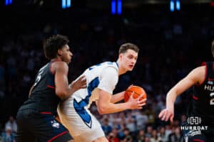 Creighton Bluejay center Ryan Kalkbrenner (11) drives to the basket against Connecticut Husky center Tarris Reed Jr. (5) during the semi-final round in the Big East Tournament Friday, March 14, 2025, New York, New York. Photo by Jordan Arnold.