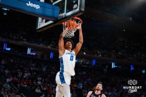Creighton Bluejay forward Jasen Green (0) dunks the ball against the Connecticut Huskies during the semi-final round in the Big East Tournament Friday, March 14, 2025, New York, New York. Photo by Jordan Arnold.