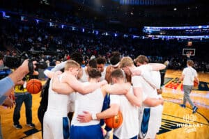 Creighton Bluejays huddle up warming up against the Connecticut Huskies during the semi-final round in the Big East Tournament Friday, March 14, 2025, New York, New York. Photo by Jordan Arnold.