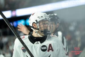 Omaha Mavericks Sam Stange looks into the crowd during a college hockey game against North Dakota on March 14th, 2025 in Omaha Nebraska. Photo by Brandon Tiedemann.