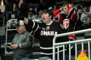 Omaha Mavericks fan is angry after a North Dakota goal during a college hockey game against North Dakota on March 14th, 2025 in Omaha Nebraska. Photo by Brandon Tiedemann.