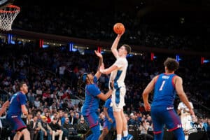 Creighton Bluejay center Ryan Kalkbrenner (11) makes a lay up against the DePaul Blue Demons during the Big East Basketball Tournament, Thursday, March 14, 2025, in New York, New York. Photo by Jordan Arnold.