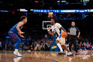 Creighton Bluejay guard Jamiya Neal (5) dribbles the ball against DePaul Blue Demon guard Isaiah Rivera (1) during the Big East Basketball Tournament, Thursday, March 14, 2025, in New York, New York. Photo by Jordan Arnold.