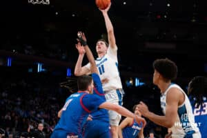 Creighton Bluejay center Ryan Kalkbrenner (11) makes a lay up against the DePaul Blue Demons during the Big East Basketball Tournament, Thursday, March 14, 2025, in New York, New York. Photo by Jordan Arnold.