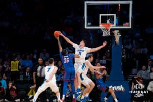 Creighton Bluejay center Ryan Kalkbrenner (11) blocks a shot by DePaul Blue Demon forward NJ Benson (35) during the Big East Basketball Tournament, Thursday, March 14, 2025, in New York, New York. Photo by Jordan Arnold.