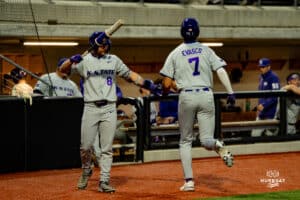 Kansas State Wildcat AJ Evasco scores a run during a baseball game at Tal Anderson Field on March 12th, 2025 in Omaha Nebraska. Photo by Collin Stilen.