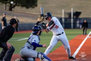 Omaha Maverick Cardel Dick swiftly dodges the pitch during a baseball game at Tal Anderson Field on March 12th, 2025 in Omaha Nebraska. Photo by Collin Stilen.