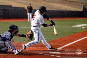 Omaha Maverick Eli Hoerner makes contact at the plate during a baseball game at Tal Anderson Field on March 12th, 2025 in Omaha Nebraska. Photo by Collin Stilen.