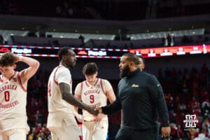 Nebraska Basketball player Juwan Gary shaking Iowa coach's hand during a college basketball game on March 09, 2025 in Lincoln, Nebraska. Photo by Logan Hock.