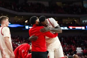Nebraska Basketball player Juwan Gary hugs coach during a college basketball game on March 09, 2025 in Lincoln, Nebraska. Photo by Logan Hock.