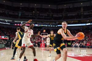 Nebraska Basketball player Juwan Gary defends against Iowa opponent Payton Sandfort during a college basketball game on March 09, 2025 in Lincoln, Nebraska. Photo by Logan Hock.
