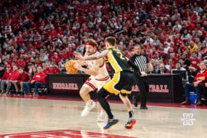 Nebraska Basketball player Sam Hoiberg dribbles toward hoop during a college basketball game on March 09, 2025 in Lincoln, Nebraska. Photo by Logan Hock.
