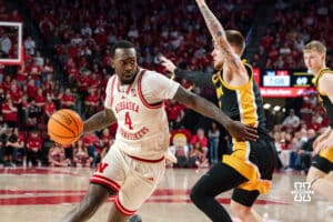 Nebraska Basketball player Juwan Gary dribbles past opponent during a college basketball game on March 09, 2025 in Lincoln, Nebraska. Photo by Logan Hock.