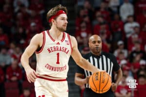 Nebraska Basketball player Sam Hoiberg dribbles down court during a college basketball game on March 09, 2025 in Lincoln, Nebraska. Photo by Logan Hock.