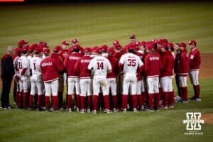 Nebraska Cornhuskers huddles up after the win against the Wichita St. Shockers during a college baseball game Tuesday, March 11, 2025 in Lincoln, Nebraska. Photo by John S. Peterson.