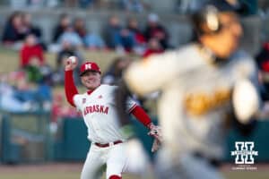 Nebraska Cornhusker third baseman Rhett Stokes (9) throws to first to beat the runnning St. Shockers in the third inning during a college baseball game Tuesday, March 11, 2025 in Lincoln, Nebraska. Photo by John S. Peterson.