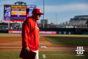 Nebraska Cornhusker assistant coach Rob Childress walks to the dugout for the start of game against the Wichita St. Shockers during a college baseball game Tuesday, March 11, 2025 in Lincoln, Nebraska. Photo by John S. Peterson.