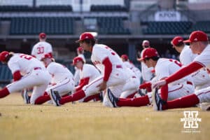 Nebraska Cornhusker pitcher J'Shawn Unger (37) stretching with the rest of the pitiching staff before taking on Wichita St. Shockers during a college baseball game Tuesday, March 11, 2025 in Lincoln, Nebraska. Photo by John S. Peterson.