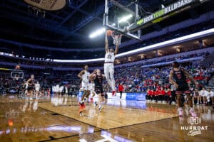 Nebraska-Omaha Maverick forward Kamryn Thomas (22) makes a basket against South Dakota Coyote guard Max Burchill (3) in the in the first half during the Summit League Tournament Saturday, March 8, 2025 in Sioux Falls, South Dakota. Photo by John S. Peterson.