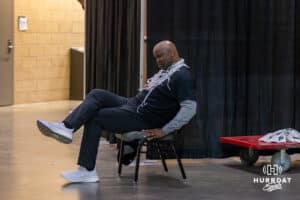 Omaha Maverick head coach Chris Cruchfield takes a break in the hallway while waiting for the press conference after the win over St. Thomas Tommies for the Summit League Championship Sunday, March 9, 2025 in Sioux Falls, South Dakota. Photo by John S. Peterson.