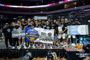 Omaha Mavericks poses for a photo after the win over St. Thomas Tommies for the championship during the Summit League Tournament Finals Sunday, March 9, 2025 in Sioux Falls, South Dakota. Photo by John S. Peterson.