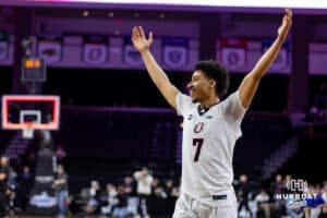 Omaha Maverick guard Lance Waddles (7) celebrates the win over the St. Thomas Tommies during the Summit League Tournament Finals Sunday, March 9, 2025 in Sioux Falls, South Dakota. Photo by John S. Peterson.