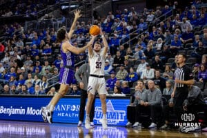Omaha Maverick guard Tony Osburn (32) makes a three-point shot against the St. Thomas Tommies in the first half during the Summit League Tournament Finals Sunday, March 9, 2025 in Sioux Falls, South Dakota. Photo by John S. Peterson.
