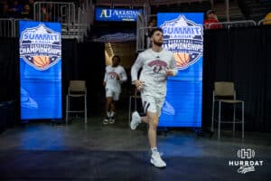 Omaha Maverick guard Tony Osburn (32) heads out to the court to take on the St. Thomas Tommies during the Summit League Tournament Finals Sunday, March 9, 2025 in Sioux Falls, South Dakota. Photo by John S. Peterson.