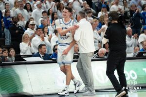 Creighton Bluejays Ryan Kalkbrenner laughs as he checks out during a college basketball game against Butler on March 8th, 2025 in Omaha Nebraska. Photo by Brandon Tiedemann.