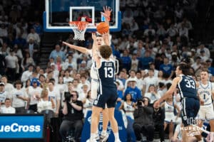 Creighton Bluejays Ryan Kalkbrenner blocks a shot during a college basketball game against Butler on March 8th, 2025 in Omaha Nebraska. Photo by Brandon Tiedemann.