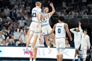 Creighton Bluejays Steven Ashworth and Jackson McAndrew celebrate during a college basketball game against Butler on March 8th, 2025 in Omaha Nebraska. Photo by Brandon Tiedemann.