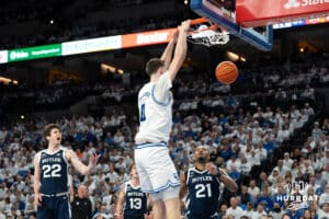 Creighton Bluejays Ryan Kalkbrenner dunks during a college basketball game against Butler on March 8th, 2025 in Omaha Nebraska. Photo by Brandon Tiedemann.