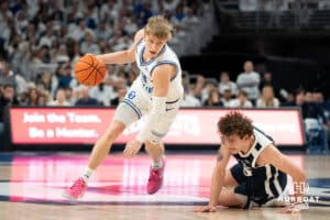Creighton Bluejays Ty Davis gets past a defender during a college basketball game against Butler on March 8th, 2025 in Omaha Nebraska. Photo by Brandon Tiedemann.