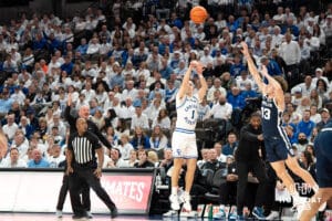 Creighton Bluejays Steven Ashworth shoots a three during a college basketball game against Butler on March 8th, 2025 in Omaha Nebraska. Photo by Brandon Tiedemann.