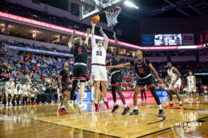 Nebraska-Omaha Maverick center Lincoln Palbicki (55) makes lay up against the South Dakota Coyotes in the second half during the Summit League Tournament Saturday, March 8, 2025 in Sioux Falls, South Dakota. Photo by John S. Peterson.