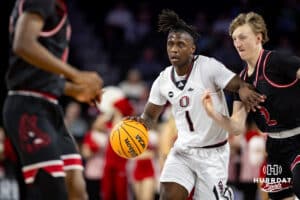 Nebraska-Omaha Maverick guard JJ White (1) dribbles the ball against South Dakota Coyote guard Shey Eberwein (2) in the second half during the Summit League Tournament Saturday, March 8, 2025 in Sioux Falls, South Dakota. Photo by John S. Peterson.