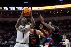 Nebraska-Omaha Maverick guard JJ White (1) drives to the basket against the South Dakota Coyotes in the first half during the Summit League Tournament Saturday, March 8, 2025 in Sioux Falls, South Dakota. Photo by John S. Peterson.