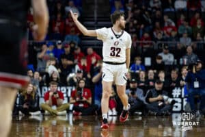 Nebraska-Omaha Maverick guard Tony Osburn (32) celebrates a three-point shot against the South Dakota Coyotes in the first half during the Summit League Tournament Saturday, March 8, 2025 in Sioux Falls, South Dakota. Photo by John S. Peterson.