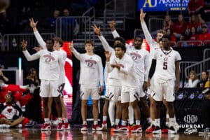 Nebraska-Omaha Mavericks bench celebrates a three-point shot by Tony Osburn in the first half against the South Dakota Coyotes during the Summit League Tournament Saturday, March 8, 2025 in Sioux Falls, South Dakota. Photo by John S. Peterson.