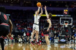 Nebraska-Omaha Maverick guard Tony Osburn (32) makes a three-point shot against the South Dakota Coyotes during the Summit League Tournament Saturday, March 8, 2025 in Sioux Falls, South Dakota. Photo by John S. Peterson.