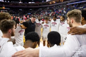 Nebraska-Omaha Mavericks huddles up before taking on the South Dakota Coyotes during the Summit League Tournament Saturday, March 8, 2025 in Sioux Falls, South Dakota. Photo by John S. Peterson.