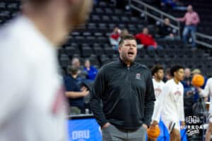 Nebraska-Omaha Mavericks associate head coach Kyan Brown works with the players in warm ups before taking on the South Dakota Coyotes during the Summit League Tournament Saturday, March 8, 2025 in Sioux Falls, South Dakota. Photo by John S. Peterson.