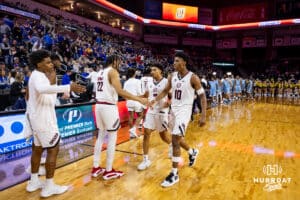 Nebraska-Omaha Mavericks forward Marquel Sutton (10) gives N forward Kamryn Thomas (22) five after the win over the UMKC Kangaroos during the Summit League Tournament Thursday, March 6, 2025 in Lincoln, Nebraska. Photo by John S. Peterson.