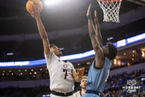 Nebraska-Omaha Mavericks guard Lance Waddles (7) makes a lay up against UMKC Kangaroos guard Babacar Diallo (2) in the first half during the Summit League Tournament Thursday, March 6, 2025 in Lincoln, Nebraska. Photo by John S. Peterson.