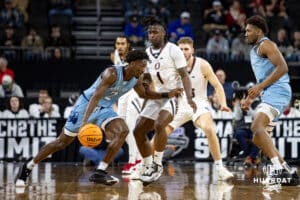 Nebraska-Omaha Mavericks guard JJ White (1) guards UMKC Kangaroos guard Babacar Diallo (2) during the Summit League Tournament Thursday, March 6, 2025 in Lincoln, Nebraska. Photo by John S. Peterson.