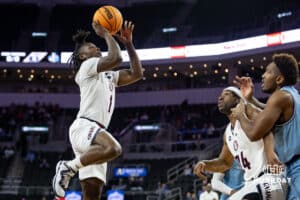 Nebraska-Omaha Mavericks guard JJ White (1) makes a lay up against the UMKC Kangaroosin the first half during the Summit League Tournament Thursday, March 6, 2025 in Lincoln, Nebraska. Photo by John S. Peterson.