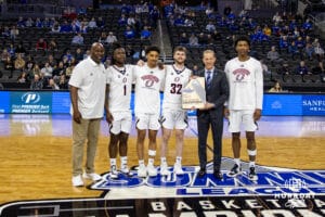 Nebraska-Omaha Mavericks presents the Regular Season Champion trophy before taking on the UMKC Kangaroos during the Summit League Tournament Thursday, March 6, 2025 in Lincoln, Nebraska. Photo by John S. Peterson.