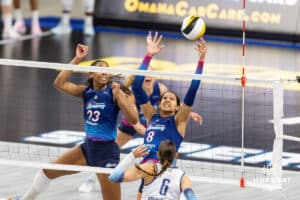 Omaha Supernovas Reagan Cooper (8) reaches for the ball against Orlando Valkyrie Brittany Abercrombie (6) during professional volleyball event Thursday, February 27, 2025 in Lincoln, Nebraska. Photo by John S. Peterson.