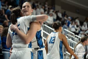 Creighton Bluejays Morgan Maly hugs Lauren Jensen during a college basketball game against Villanova on March 2nd, 2025 in Omaha Nebraska. Photo by Brandon Tiedemann.